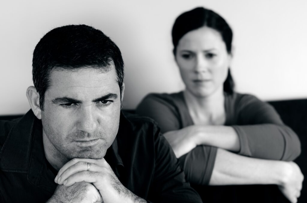 Unhappy husband upset wife